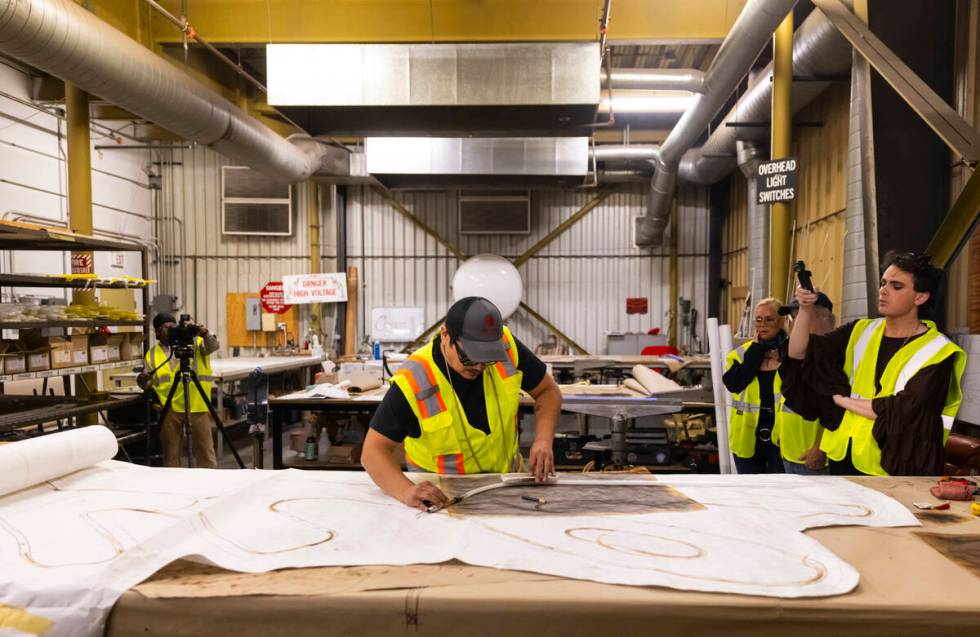 YESCO neon bender Oscar Gonzalez bends a glass tube on Wednesday, Sept. 11, 2024, at YESCO in L ...