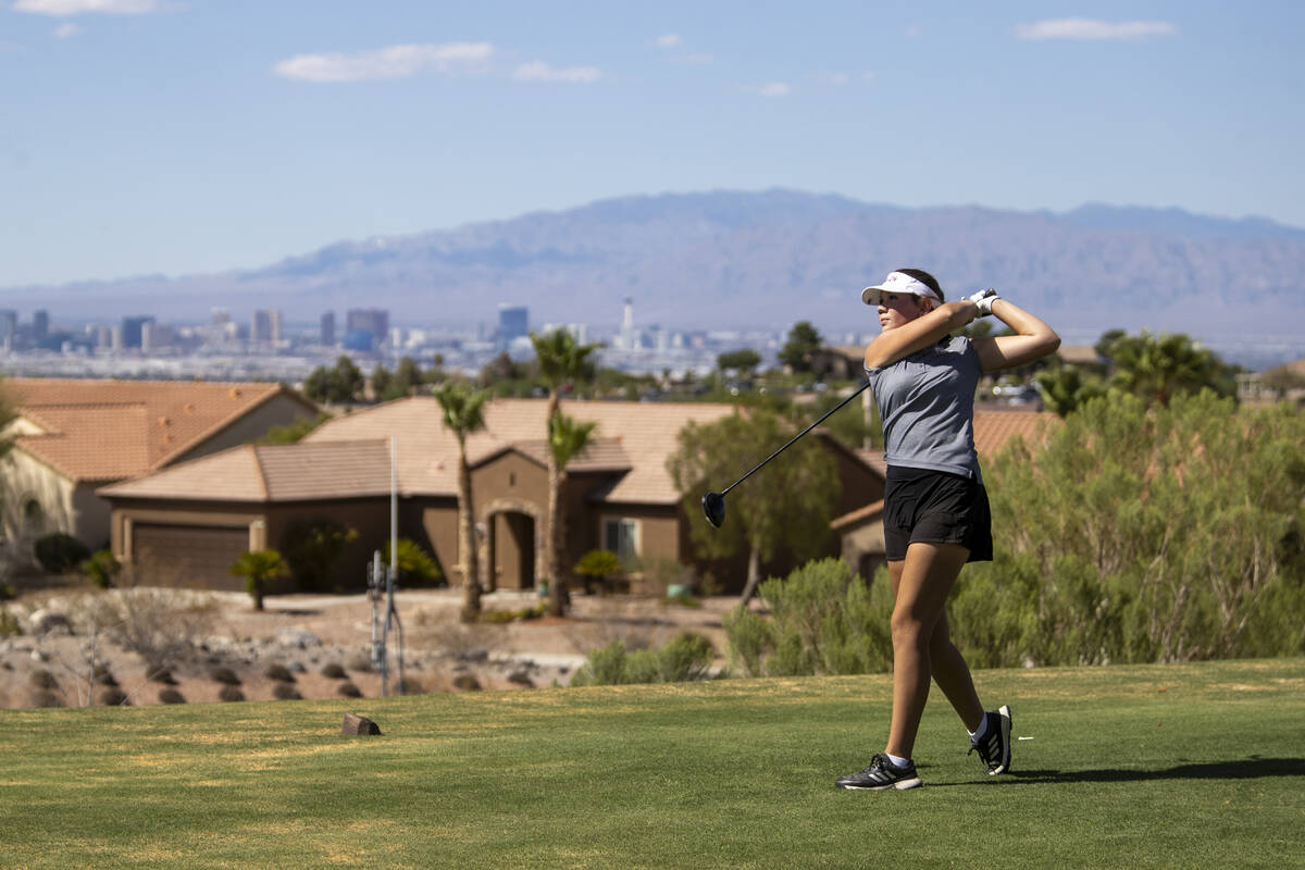 Faith Lutheran’s Maddie Perez drives her ball down to hole 11 during the 5A Desert Leagu ...