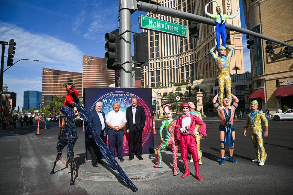 Cirque du Soleil performers for "Mystère" unveil the Mystère Dreams Ave sign on the Las Vegas ...