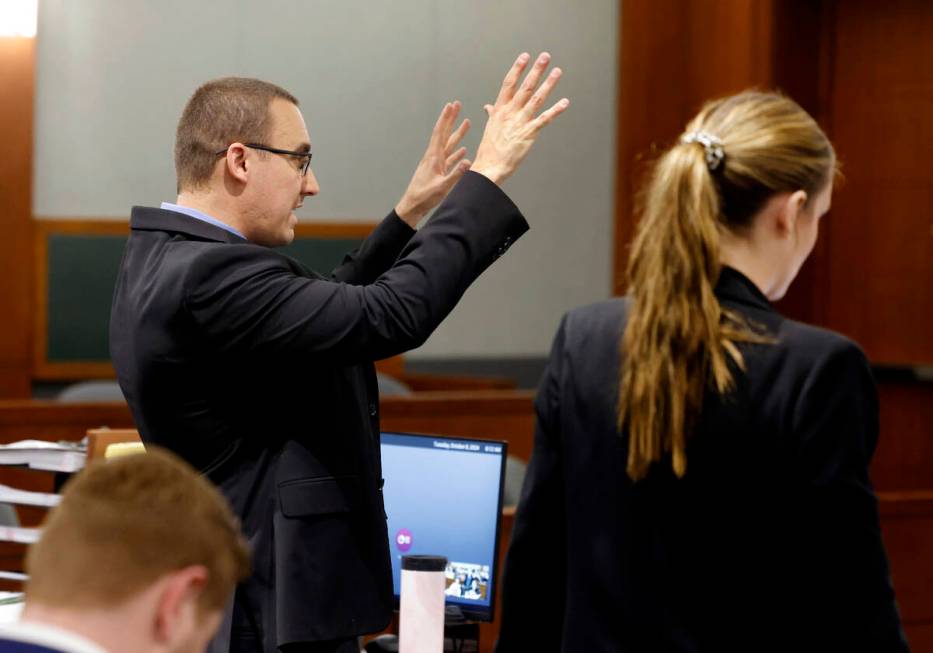 Prosecutor Kennedy Holthus, right, listens as Attorney Ryan Helmick, representing Serge Kamga, ...