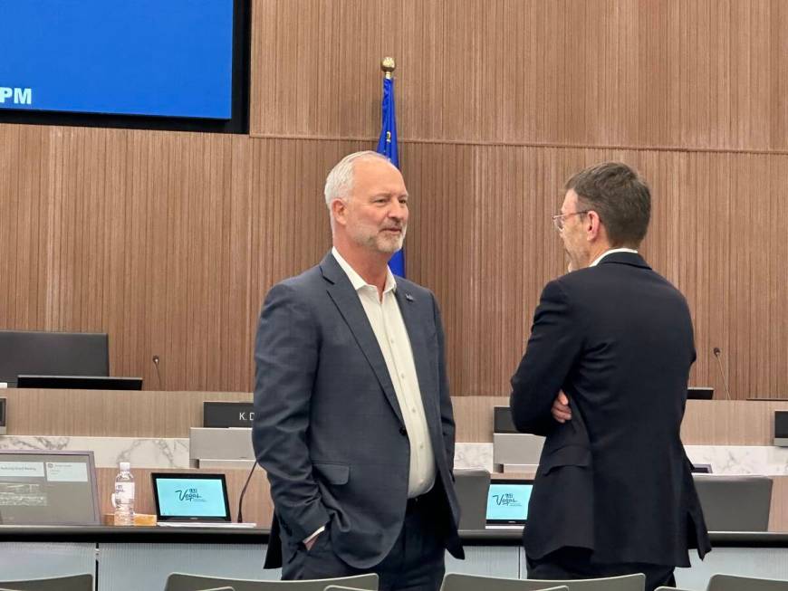 Las Vegas Stadium Authority Chairman Steve Hill, left, chats with Oakland Athletics executive S ...