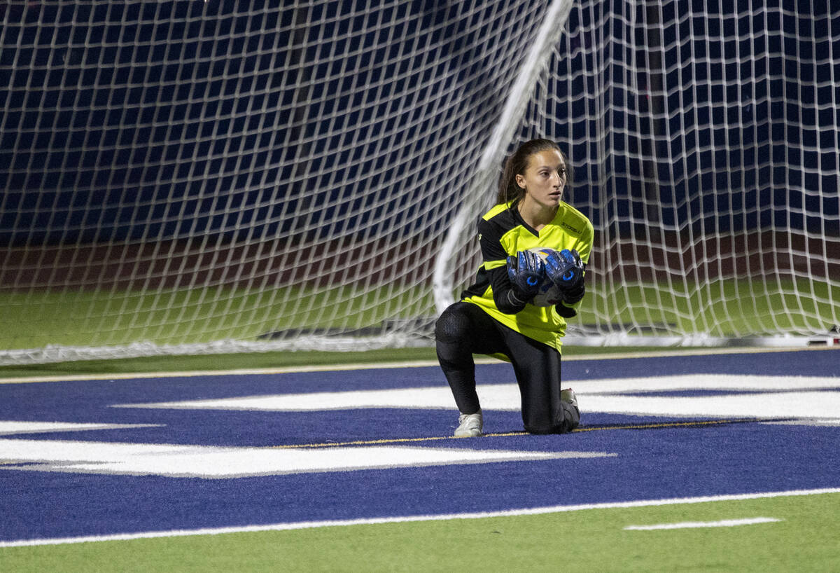 Green Valley goalkeeper Olivia Geeb (17) covers the ball during the high school soccer game aga ...