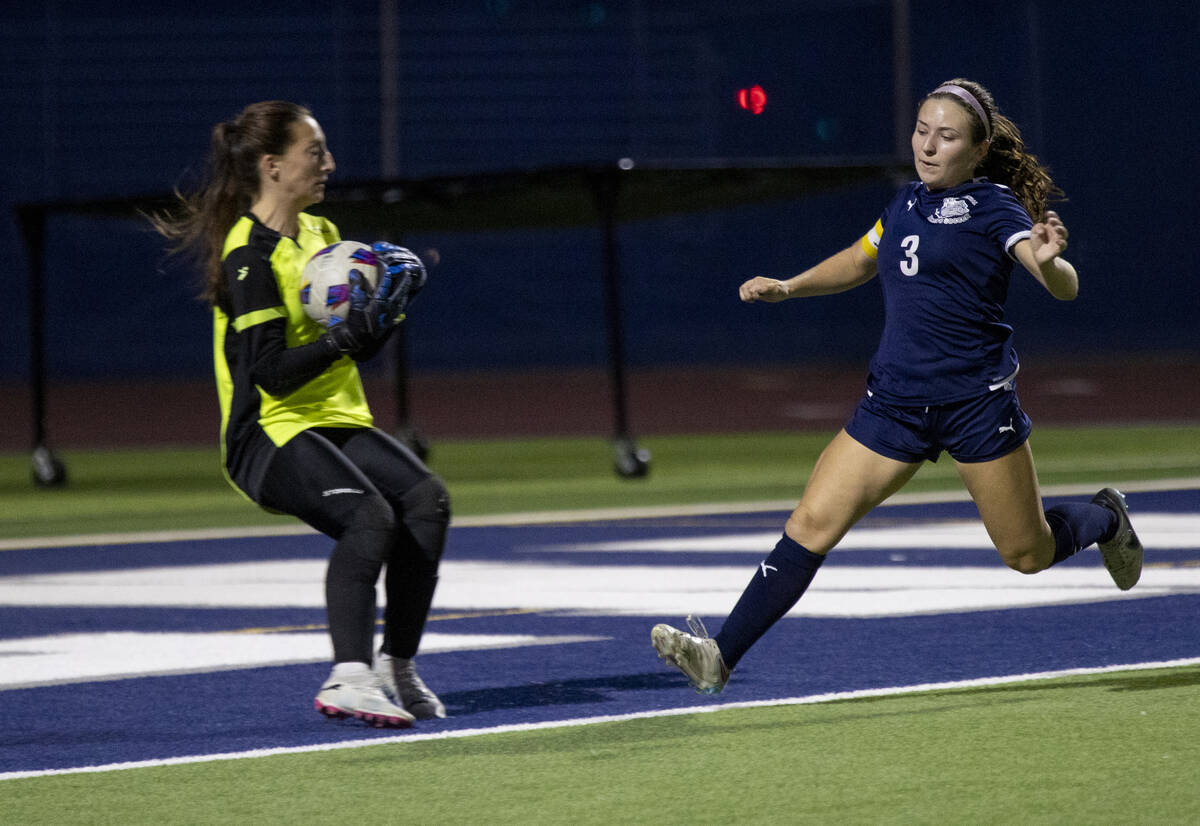 Centennial forward Natalie Sligar (3) runs toward Green Valley goalkeeper Olivia Geeb (17) duri ...