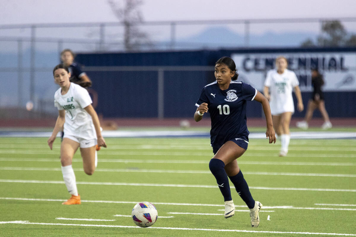 Centennial midfielder Alexandra Miranda (10) runs with the ball during the high school soccer g ...