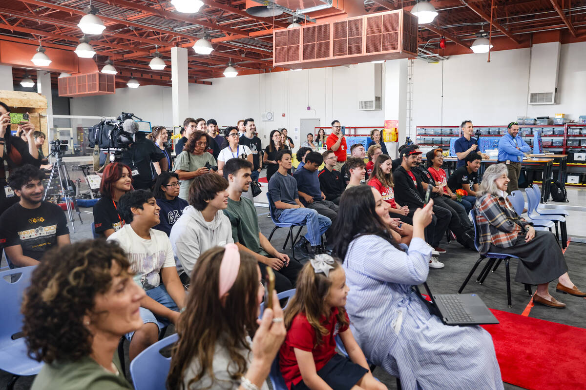 The crowd listens during a presentation honoring manufacturing teacher Alex Bechtler at Southea ...