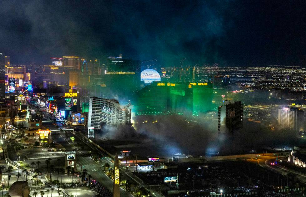 The Tropicana is imploded early in the morning while viewed from the Foundation Room at the Man ...