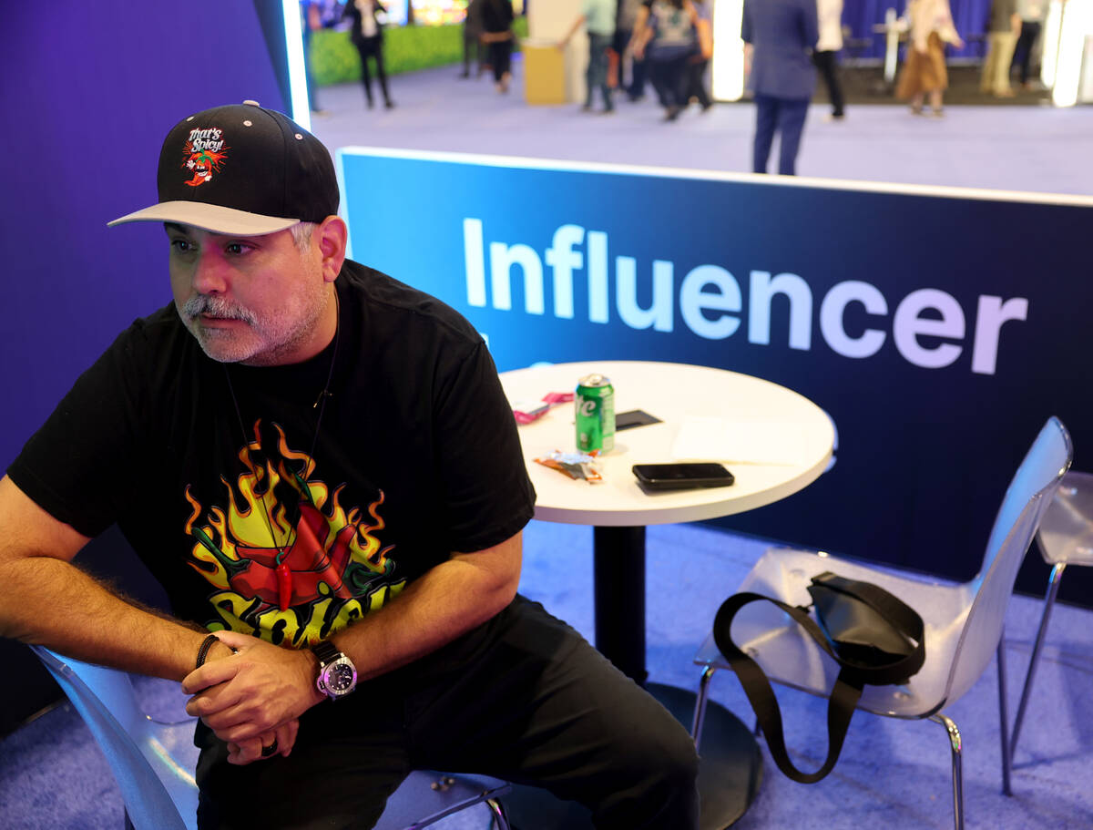 J.J. Feregrino of Uncle J Slots talks to a reporter in the influencer lounge at Global Gaming E ...