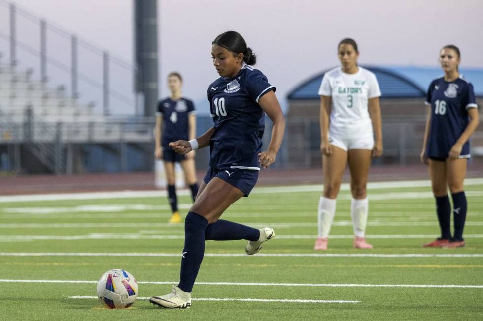 Centennial midfielder Alexandra Miranda (10) attempts a penalty kick, scoring Centennial’s fi ...