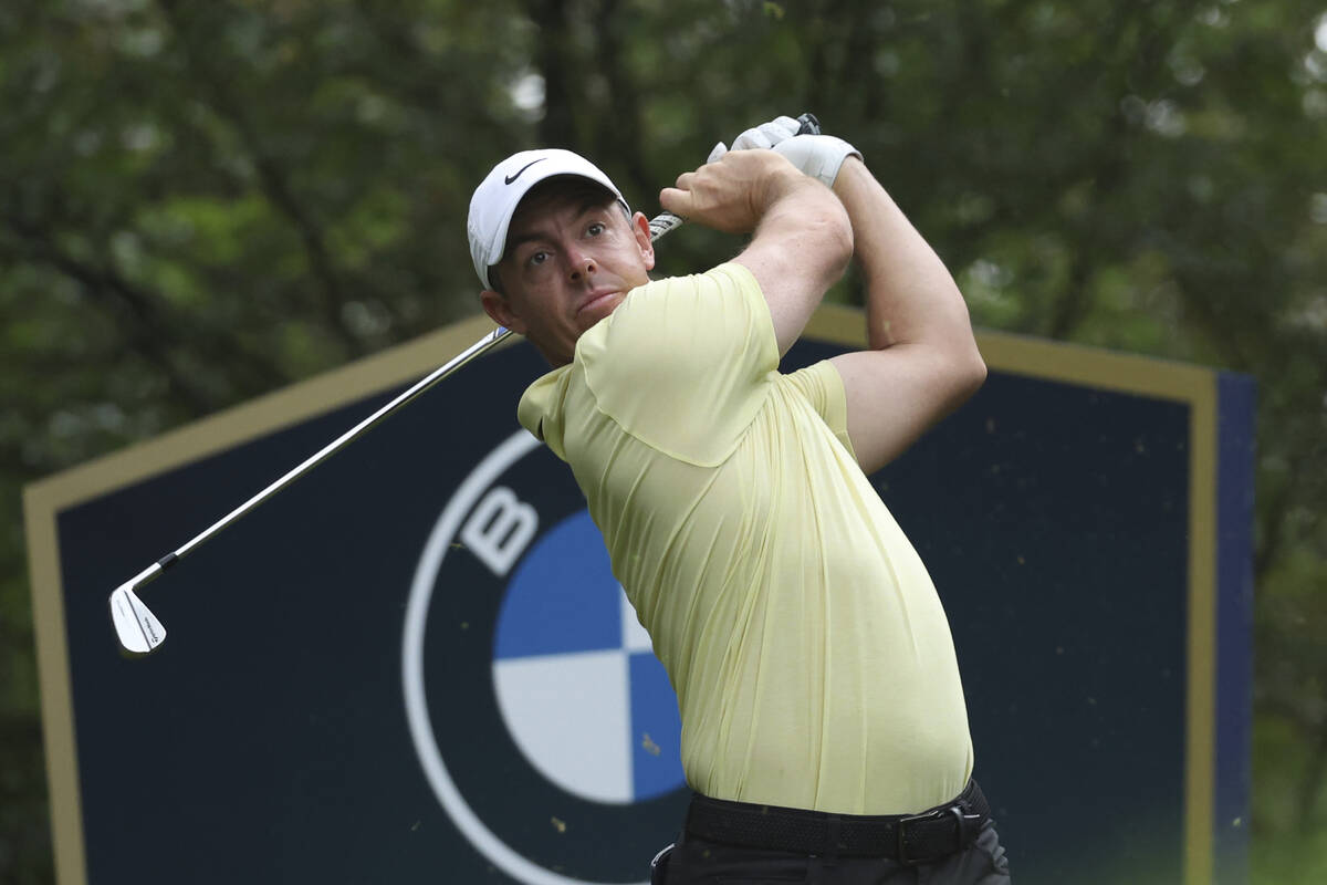 Rory McIlroy, of Northern Ireland, plays off the 5th tee during the final round of the British ...