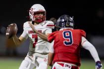 Arbor View quarterback Thaddeus Thatcher (7) looks to throw the ball during the high school foo ...