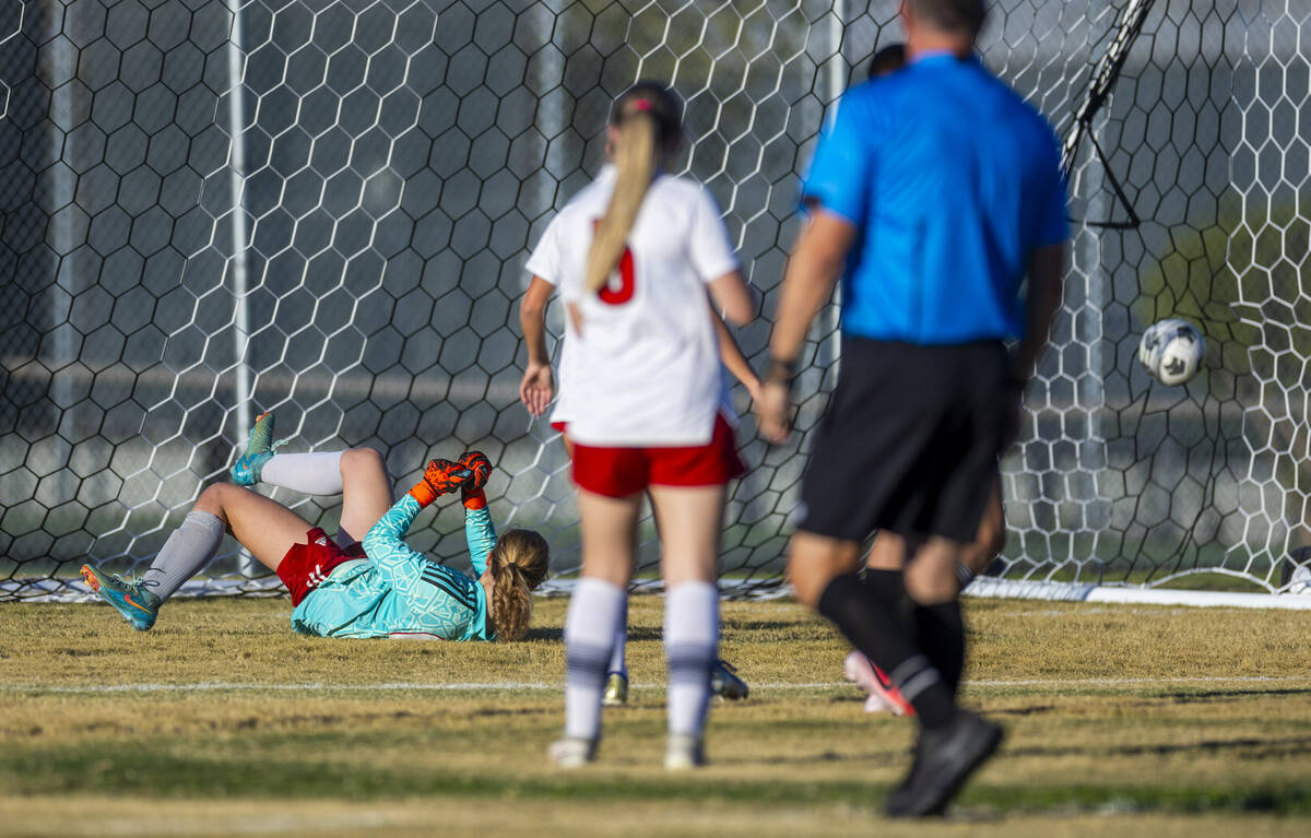 Liberty goalkeeper Brooke Kramer (00) looks to a ball in the net scored by Palo Verde during th ...