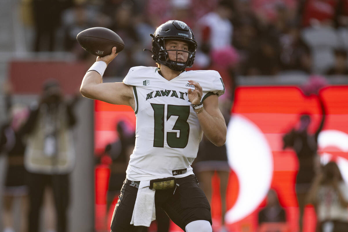 Hawaii quarterback Brayden Schager (13) throws a pass during an NCAA football game against San ...