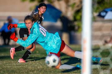 Palo Verde forward Olivia Gastwirth (4) scores on Liberty goalkeeper Brooke Kramer (00) during ...