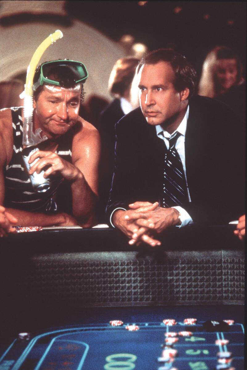 Actor Randy Quaid, left, performs a scene with Chevy Chase in the motion picture "Vegas Vacatio ...