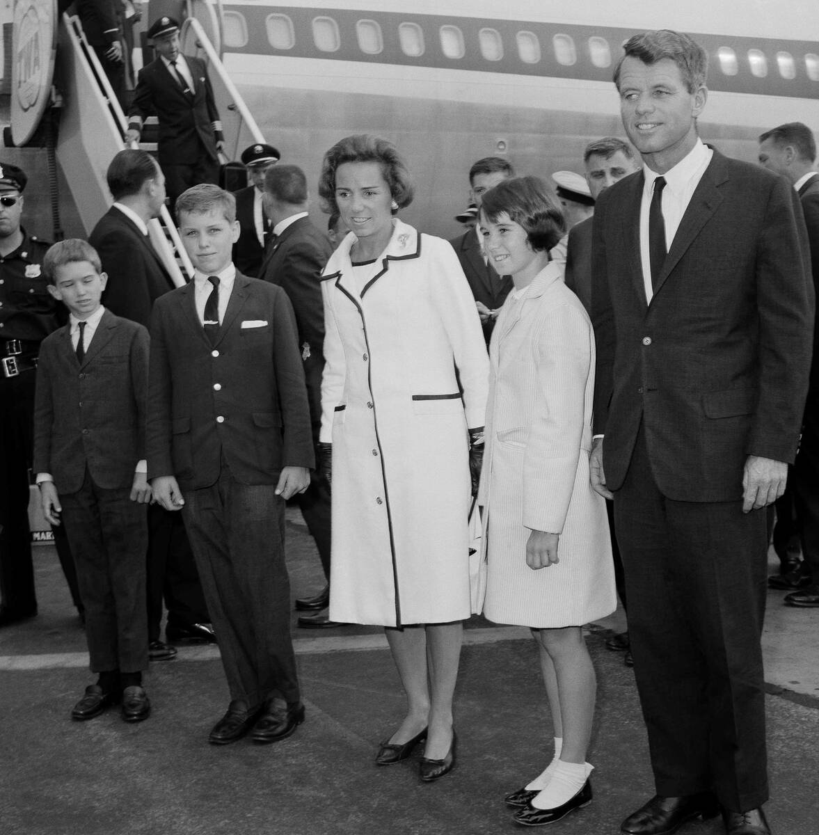 Attorney General Robert F. Kennedy and members of his family pose near jetliner at Kennedy Inte ...