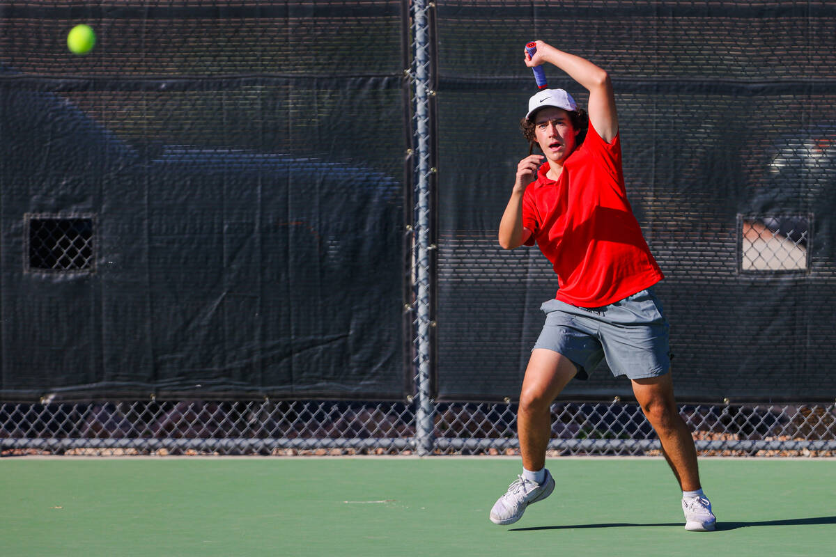 Coronado’s Jacob Gardner hits the ball during a 5A high school boys tennis state champio ...