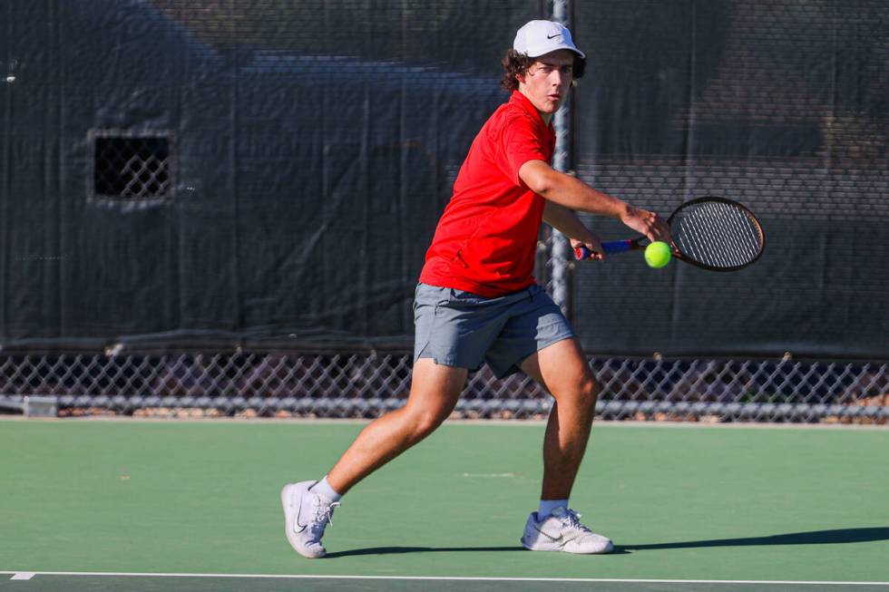 Coronado’s Jacob Gardner hits the ball during a 5A high school boys tennis state champio ...