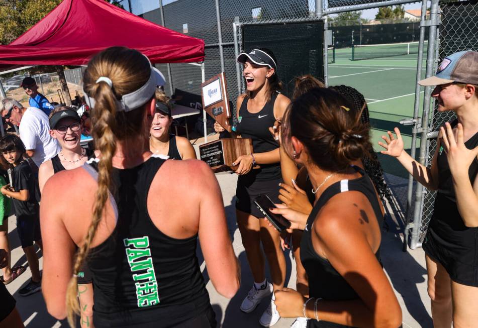 The Palo Verde High School girls tennis team celebrates winning the Class 5A tennis state champ ...