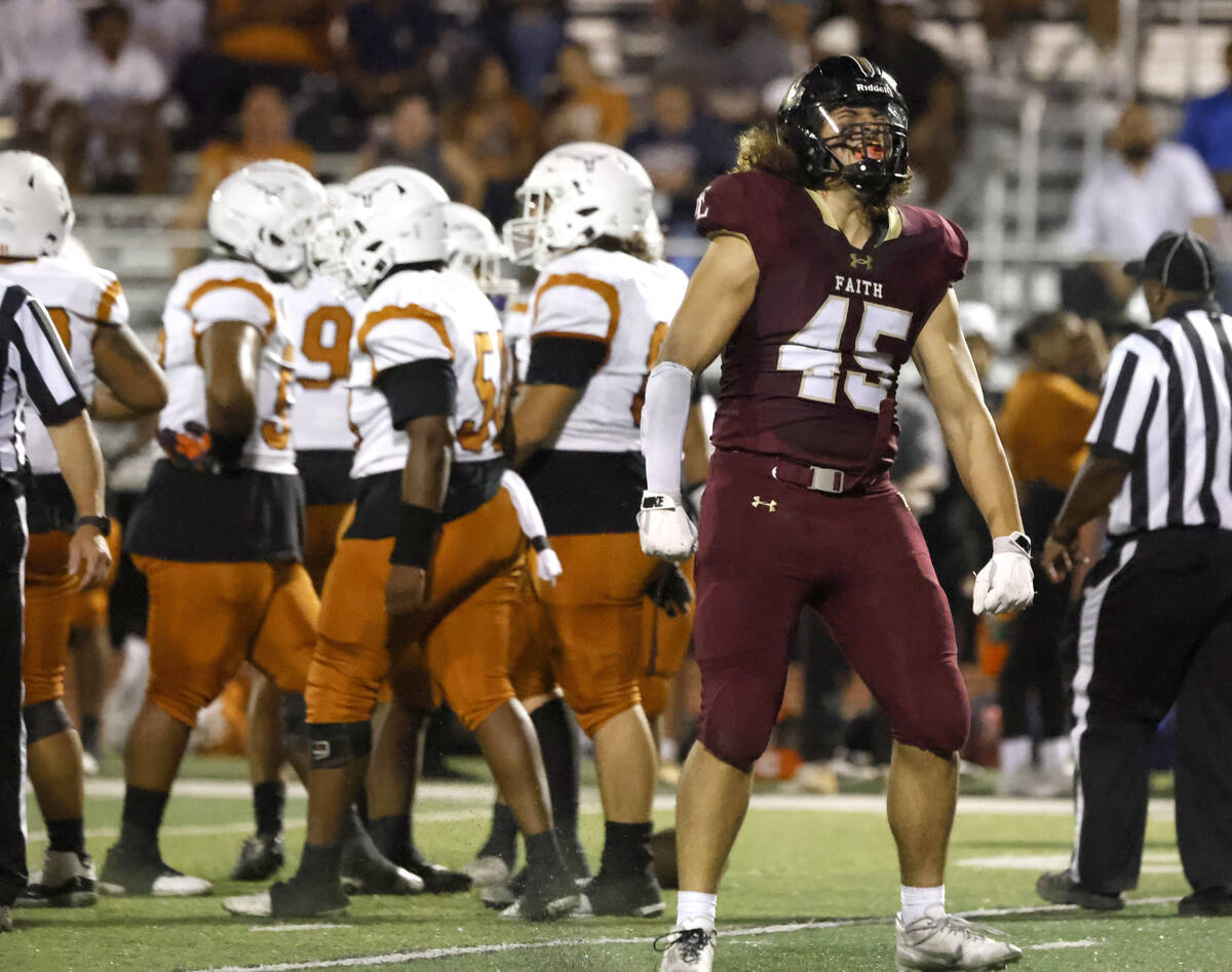 Faith Lutheran High's defensive line Maddox Valoaga (45) reacts after sacking Legacy High's qua ...