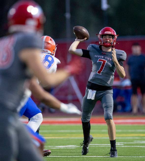 Arbor View quarterback Thaddeus Thatcher (7) throws the ball during the high school football ga ...