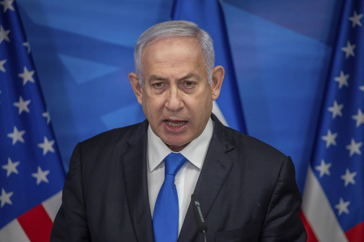 Israeli Prime Minister Benjamin Netanyahu delivers a statement following his meeting with US Se ...