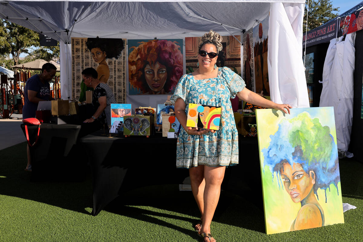 Tara Banfield of Henderson shows her art during Summerlin Festival of Arts in Downtown Summerli ...