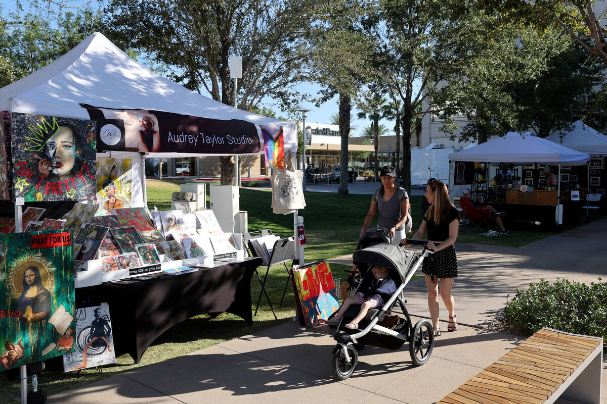 People browse artist booths during Summerlin Festival of Arts in Downtown Summerlin in Las Vega ...