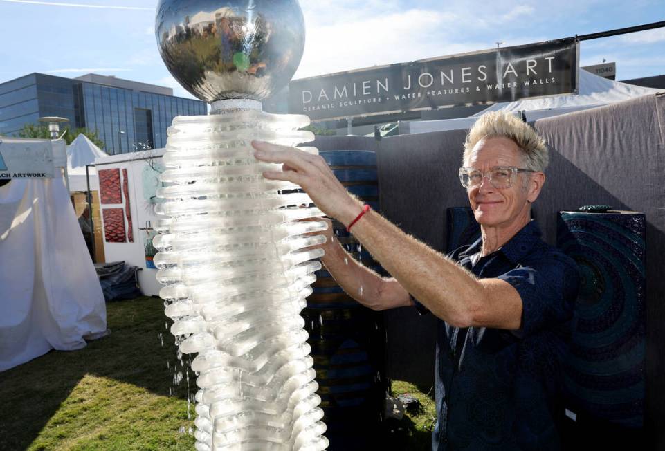 Damien Jones of Los Angeles shows his water features art during Summerlin Festival of Arts in D ...