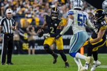 Pittsburgh Steelers quarterback Justin Fields (2) scrambles during an NFL football game, Sunday ...