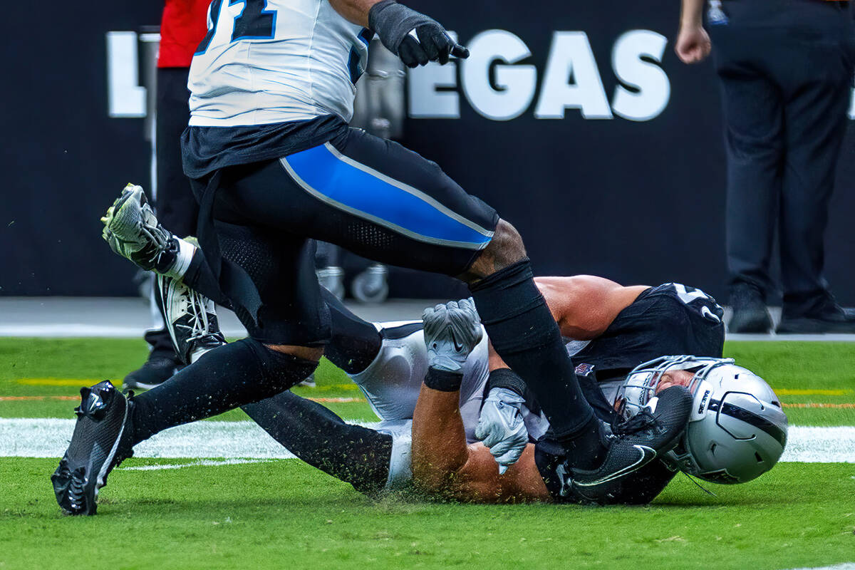 Raiders tight end Michael Mayer (87) takes a cleat to the face when down by Carolina Panthers l ...