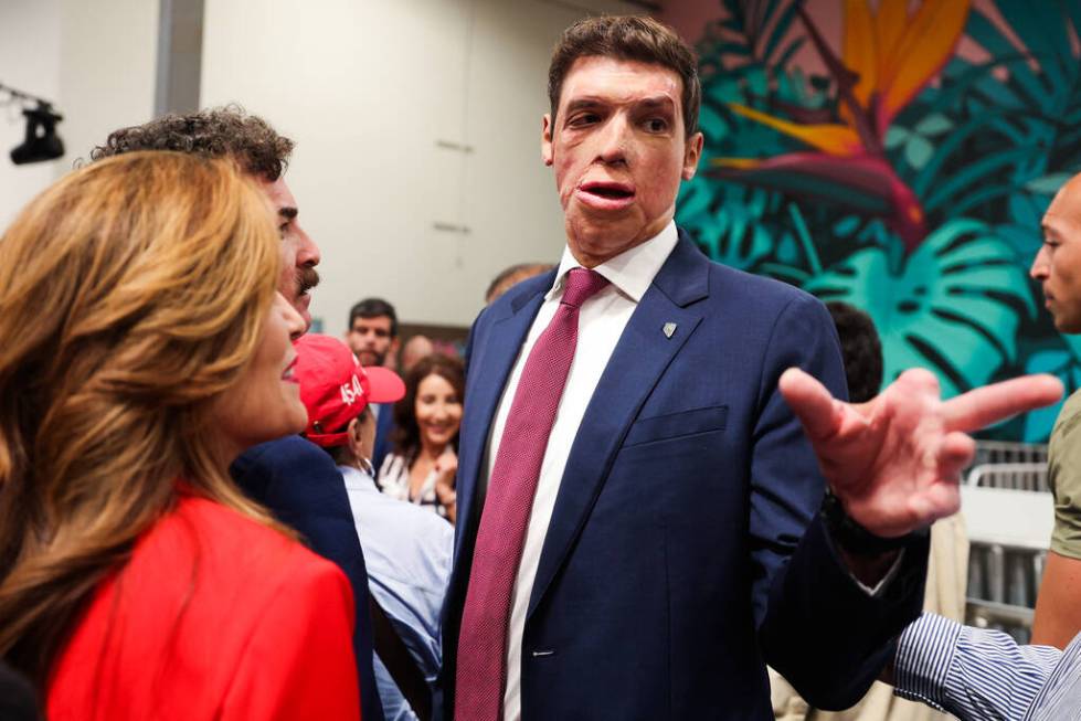 Republican senate candidate Sam Brown is greeted during a Building America’s Future roun ...