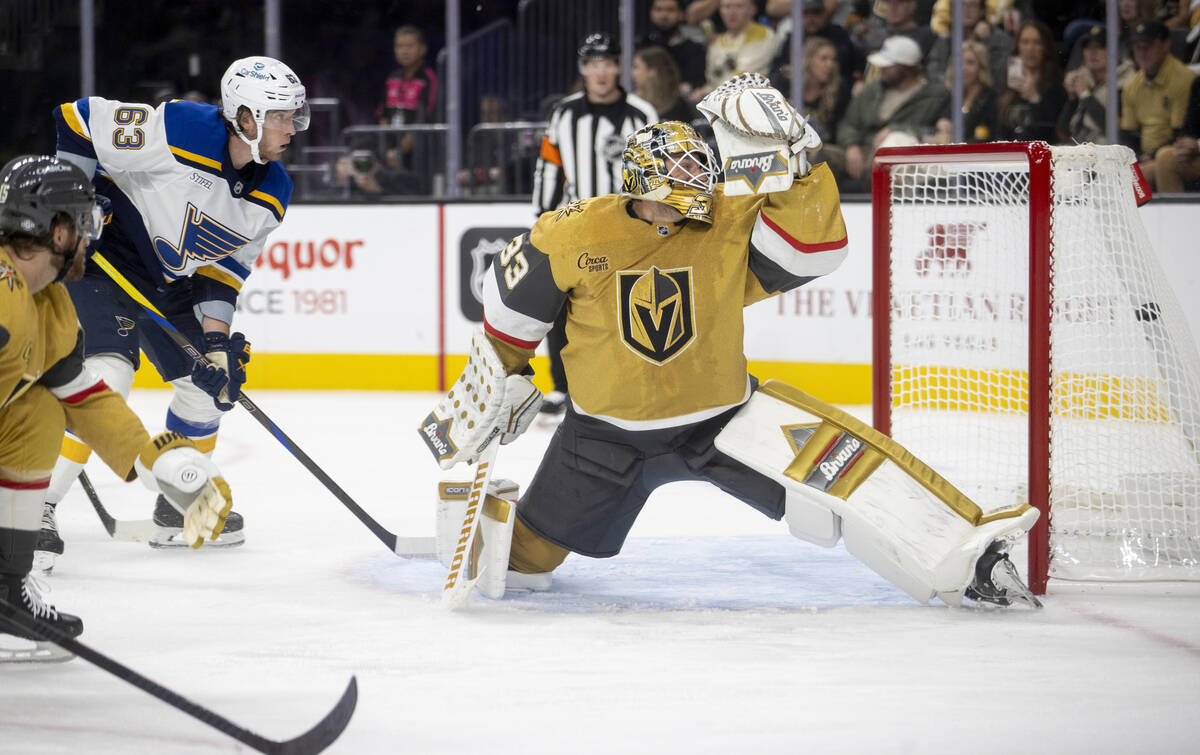 A puck shot by St. Louis Blues left wing Pavel Buchnevich, not pictured, lands in the net past ...