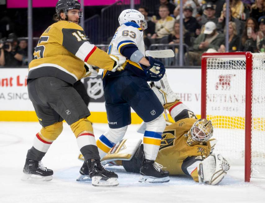 Golden Knights goaltender Adin Hill (33) blocks a shot during the NHL hockey game against the S ...