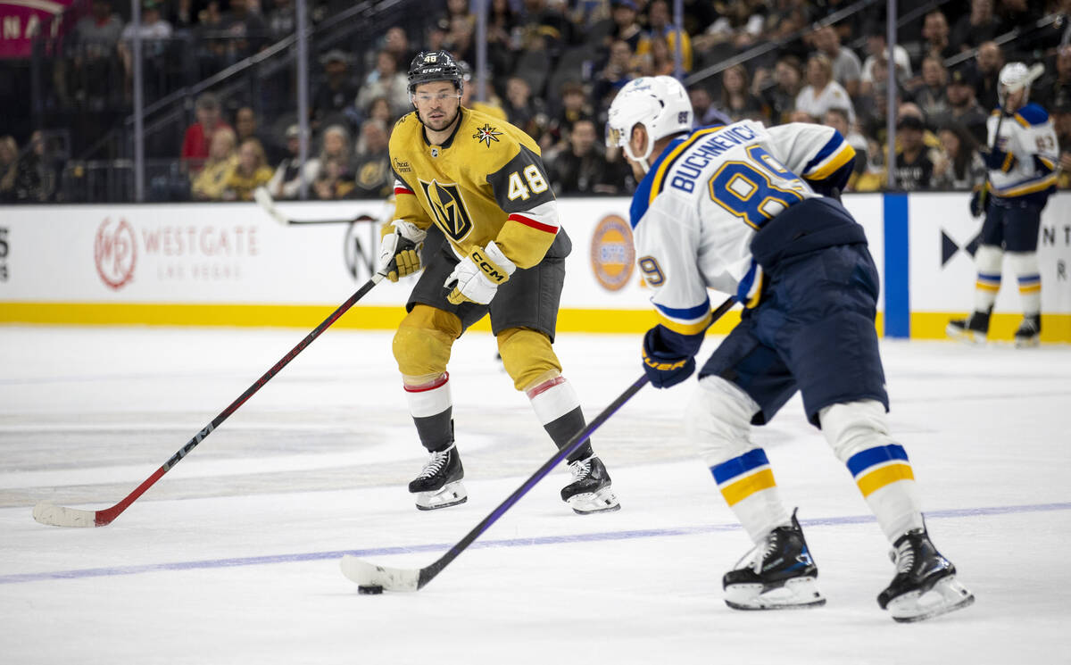 Golden Knights center Tomas Hertl (48) watches St. Louis Blues left wing Pavel Buchnevich (89) ...