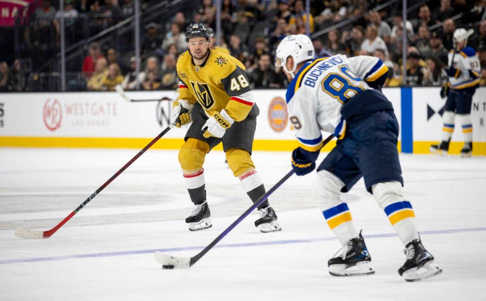 Golden Knights center Tomas Hertl (48) watches St. Louis Blues left wing Pavel Buchnevich (89) ...