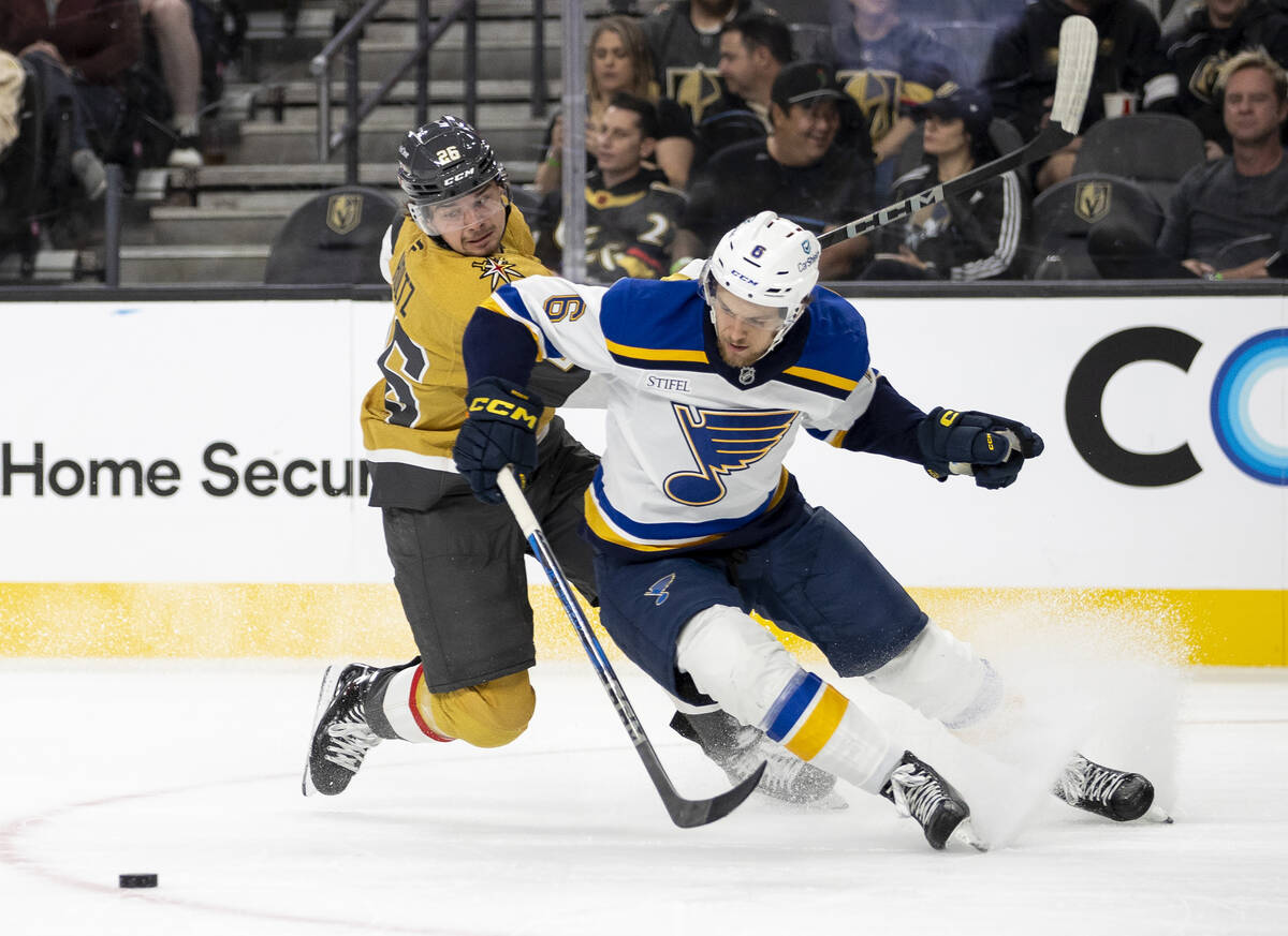 St. Louis Blues defenseman Philip Broberg (6) and Golden Knights right wing Alexander Holtz (26 ...