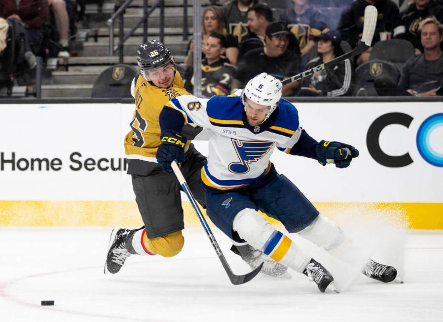 St. Louis Blues defenseman Philip Broberg (6) and Golden Knights right wing Alexander Holtz (26 ...