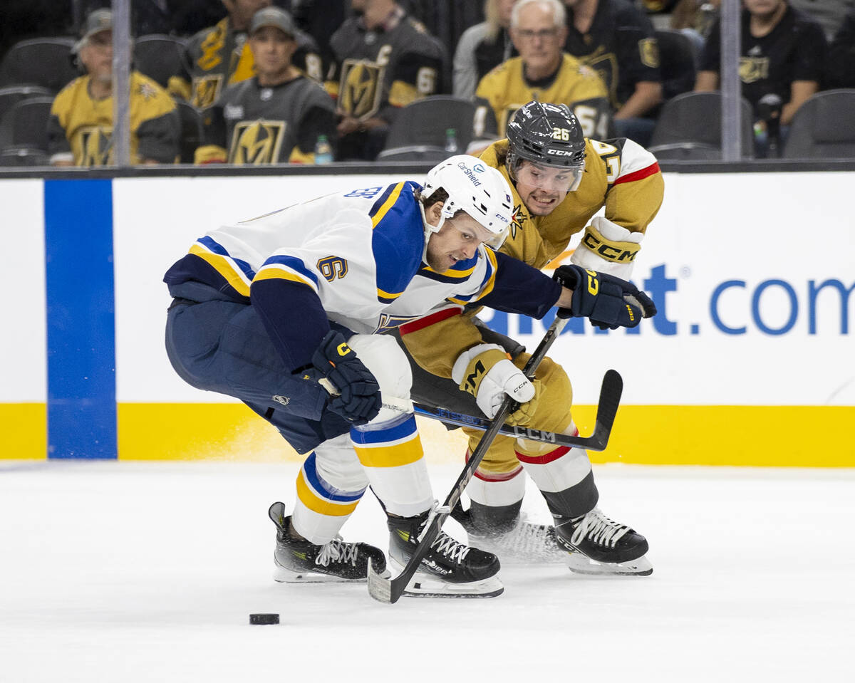 St. Louis Blues defenseman Philip Broberg (6) and Golden Knights right wing Alexander Holtz (26 ...