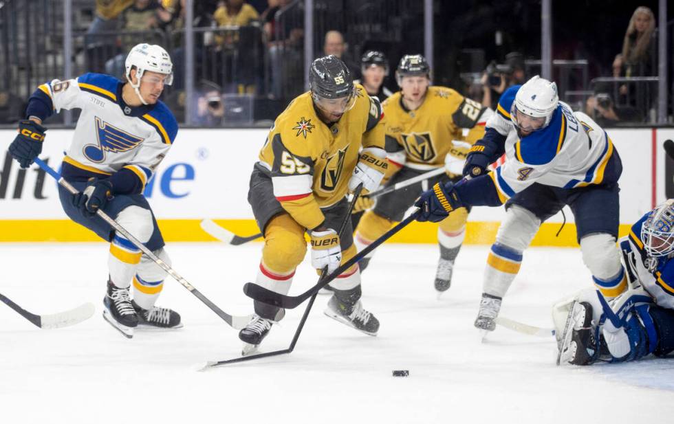 St. Louis Blues defenseman Nick Leddy (4) snaps the stick of Golden Knights right wing Keegan K ...