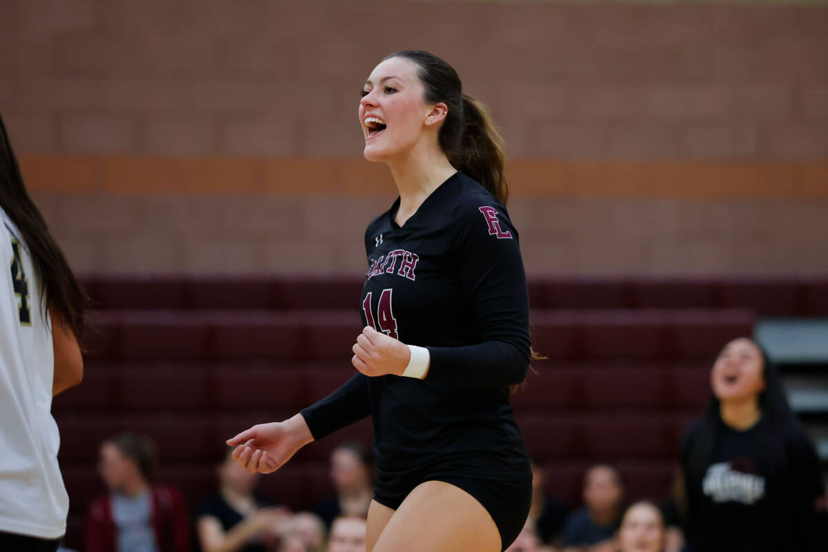 Faith Lutheran Sienna Lopez (14) celebrates after Faith Lutheran scored point during a volleyba ...