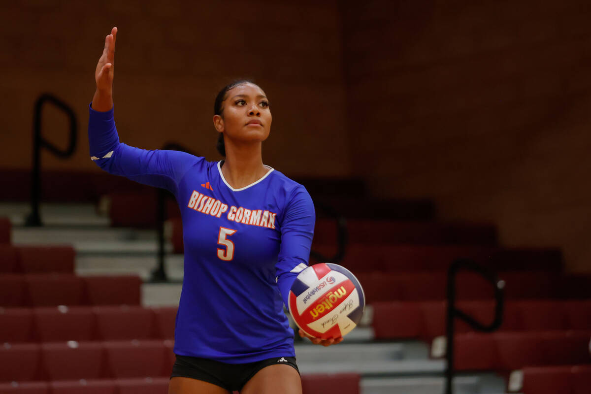 Bishop Gorman outside hitter Carsyn Stansberry (5) serves the ball during a volleyball game bet ...