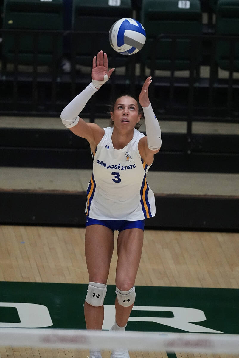 San Jose State outer hitter Blaire Fleming serves the ball in the first set of an NCAA college ...