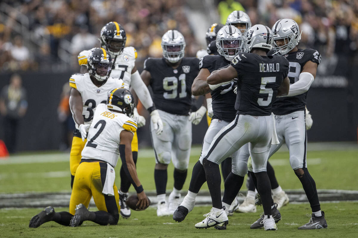 Raiders linebacker Divine Deablo (5) celebrates his sack of Pittsburgh Steelers quarterback Jus ...