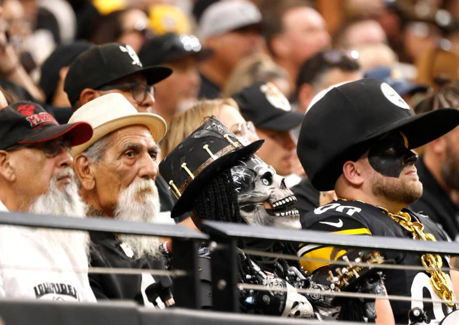 Raiders fans watch an NFL game against Pittsburgh at Allegiant Stadium, on Sunday, Oct. 13, 202 ...