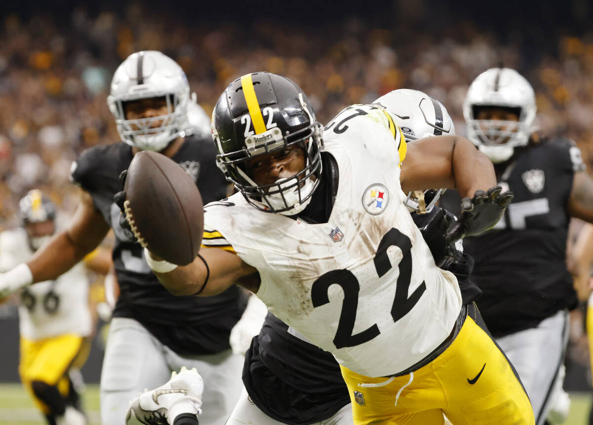 Pittsburgh Steelers running back Najee Harris (22) dives for extra yardage against Raiders duri ...