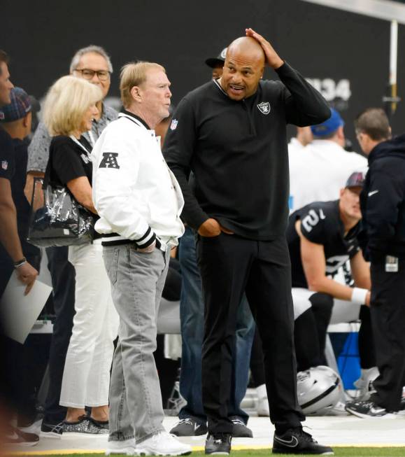 Raiders owner Mark Davis and head coach Antonio Pierce chat before an NFL game against Pittsbur ...