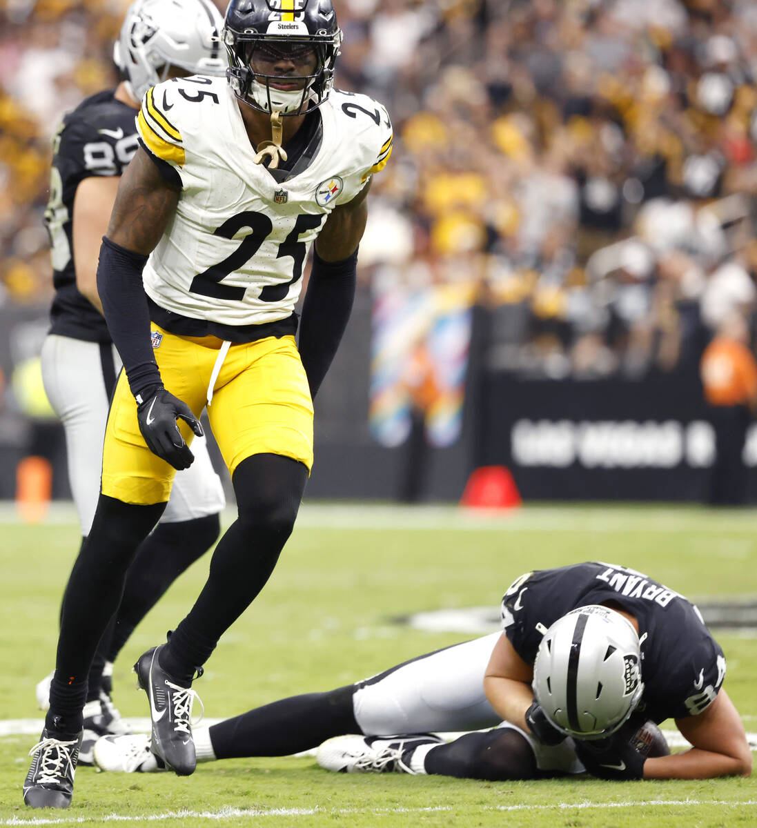 Pittsburgh Steelers safety DeShon Elliott (25) reacts after taking Raiders tight end Harrison B ...