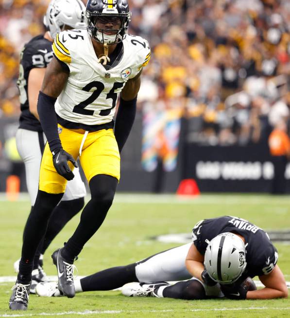 Pittsburgh Steelers safety DeShon Elliott (25) reacts after taking Raiders tight end Harrison B ...