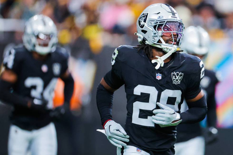 Raiders safety Chris Smith II (29) runs back to the sidelines during the second half of an NFL ...