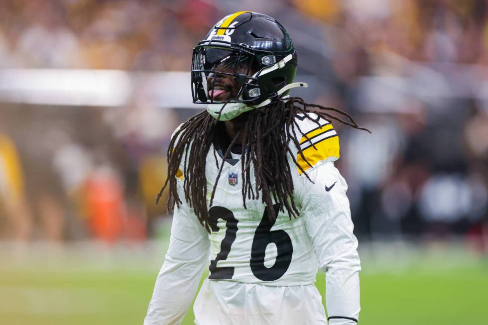 Pittsburgh Steelers cornerback Donte Jackson (26) sticks his tongue out after nearly intercepti ...